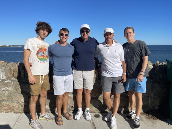 Community members by the coast